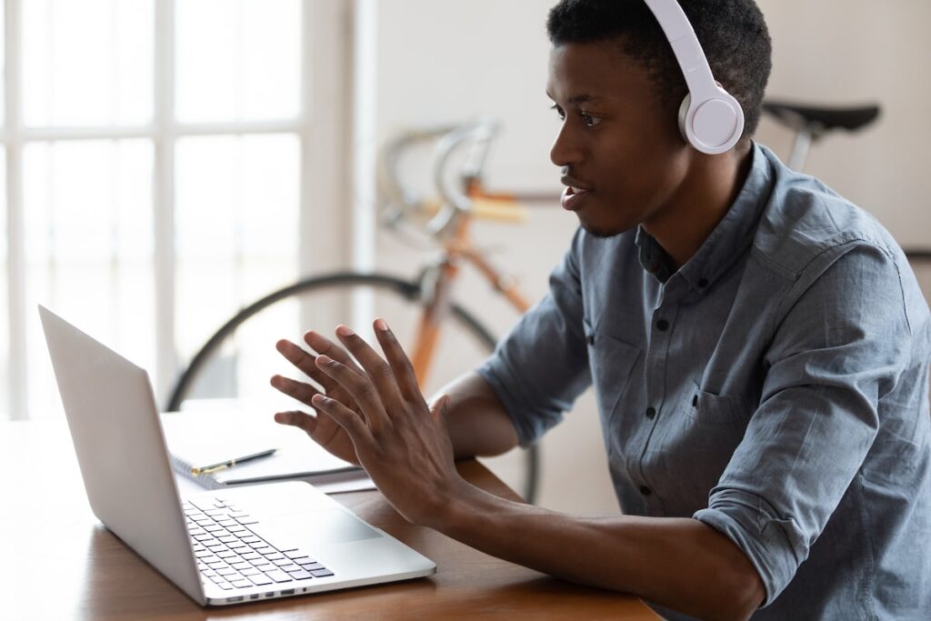 Virtual assistant working on his computer.