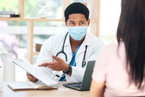A doctor explaining legal papers