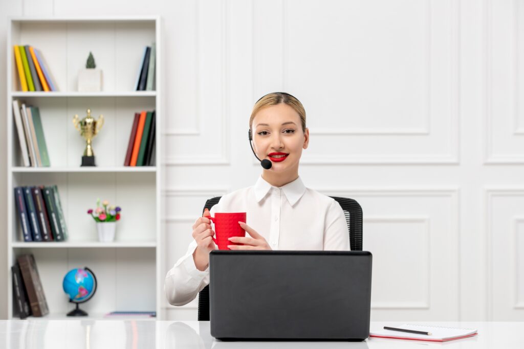 Customer service woman holding red mug