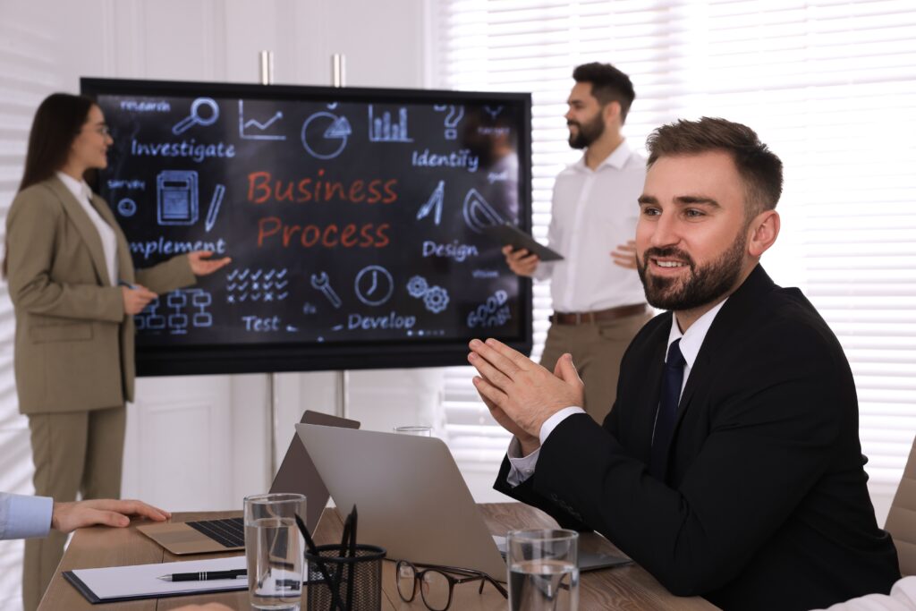 Business meeting discussing business process strategy